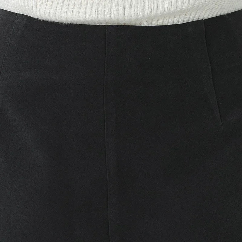 Close-up of back waist structure showing two precision darts — From Borcelleclothes.