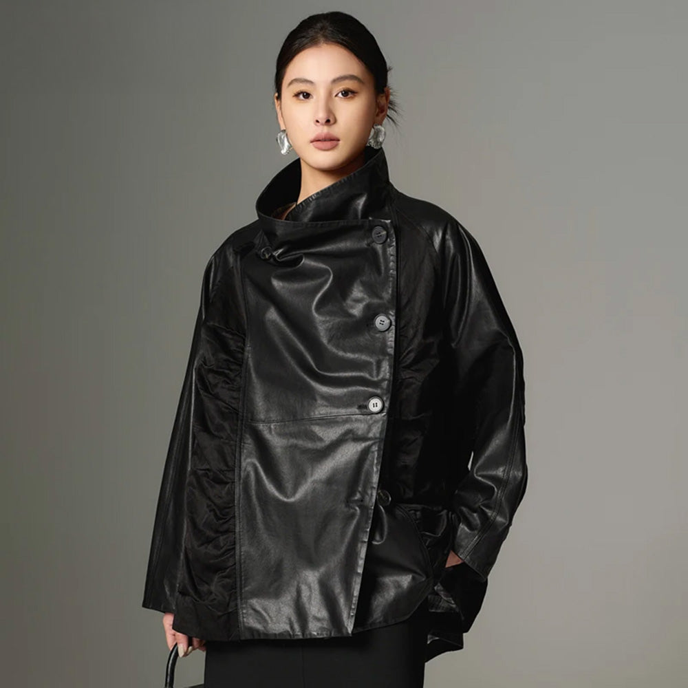 Women's Architectural cowhide loose-fitting wrap jacket in Beneath the Mask, featuring memory-wire ruched wedges, generous lapels convertible into a high stand collar. — From Borcelleclothes.