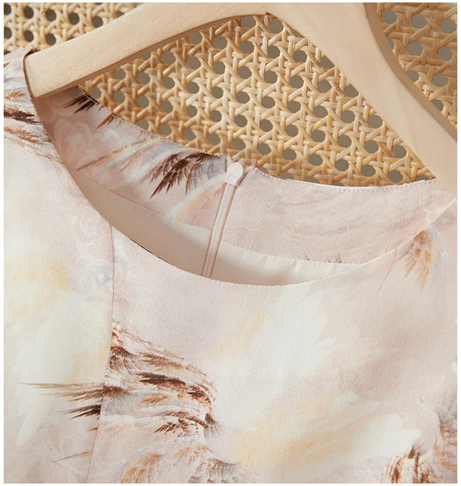 Close-up of the deep rounded neckline, finished with a discrete silk facing for a clean and elegant frame — From Borcelleclothes.