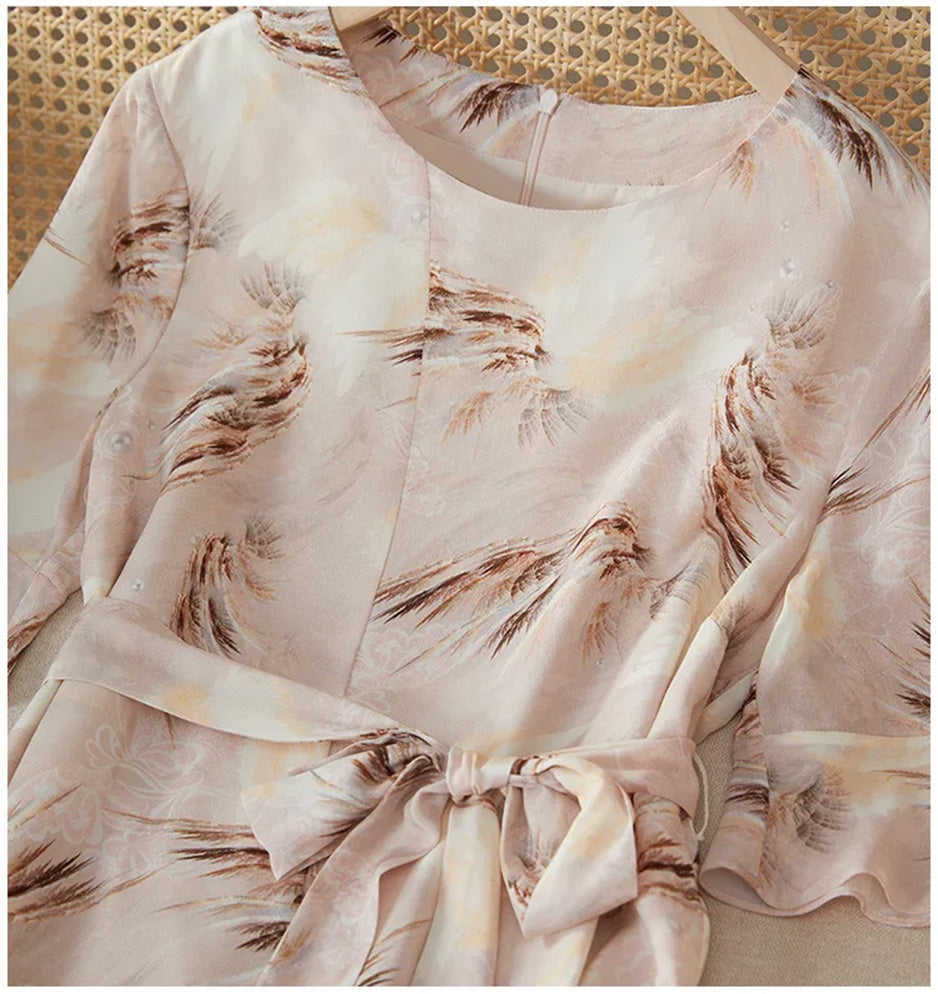 The upper bodice construction of the "First Light" dress, where silk meets art in a seamless, nature-inspired print — From Borcelleclothes.