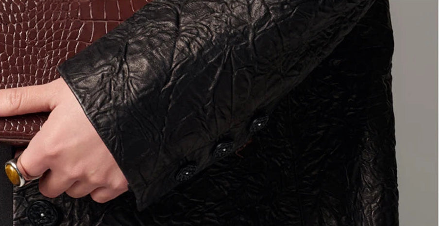 Detailed close-up of the sleeve cuff on a crinkled full-grain sheepskin jacket — From Borcelleclothes.