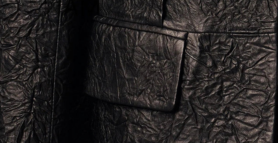 Detailed view of the tailored pocket flap on crinkled full-grain sheepskin leather — From Borcelleclothes.