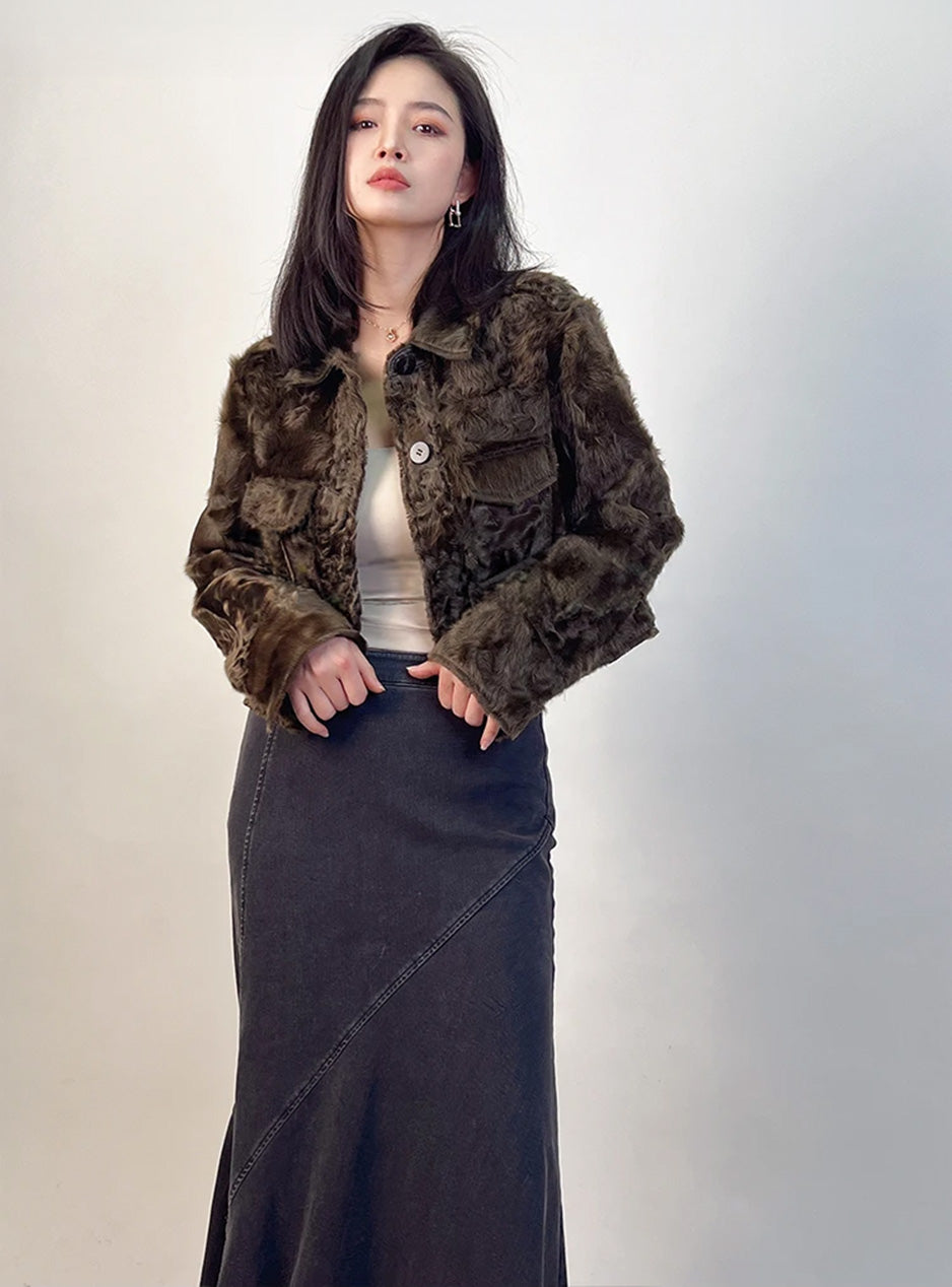 The Star Anise shearling jacket worn unfastened, showing the fluid waves of the Xiaohu fleece and the relaxed, audacious drape. — From Borcelleclothes.