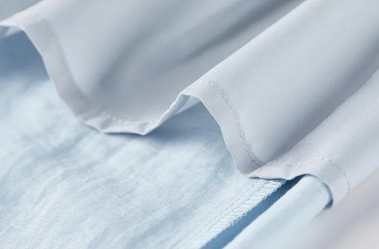 Interior view of the Lapis Shimmer wide-leg trousers, showing the high-quality polyester lining. From Borcelleclothes.