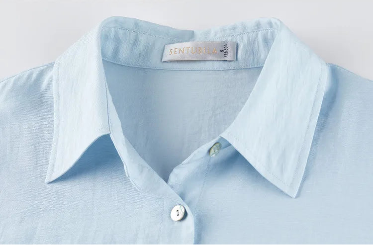 Close-up of the Lapis Shimmer shirt collar, demonstrating the crisp, architectural design. From Borcelleclothes.