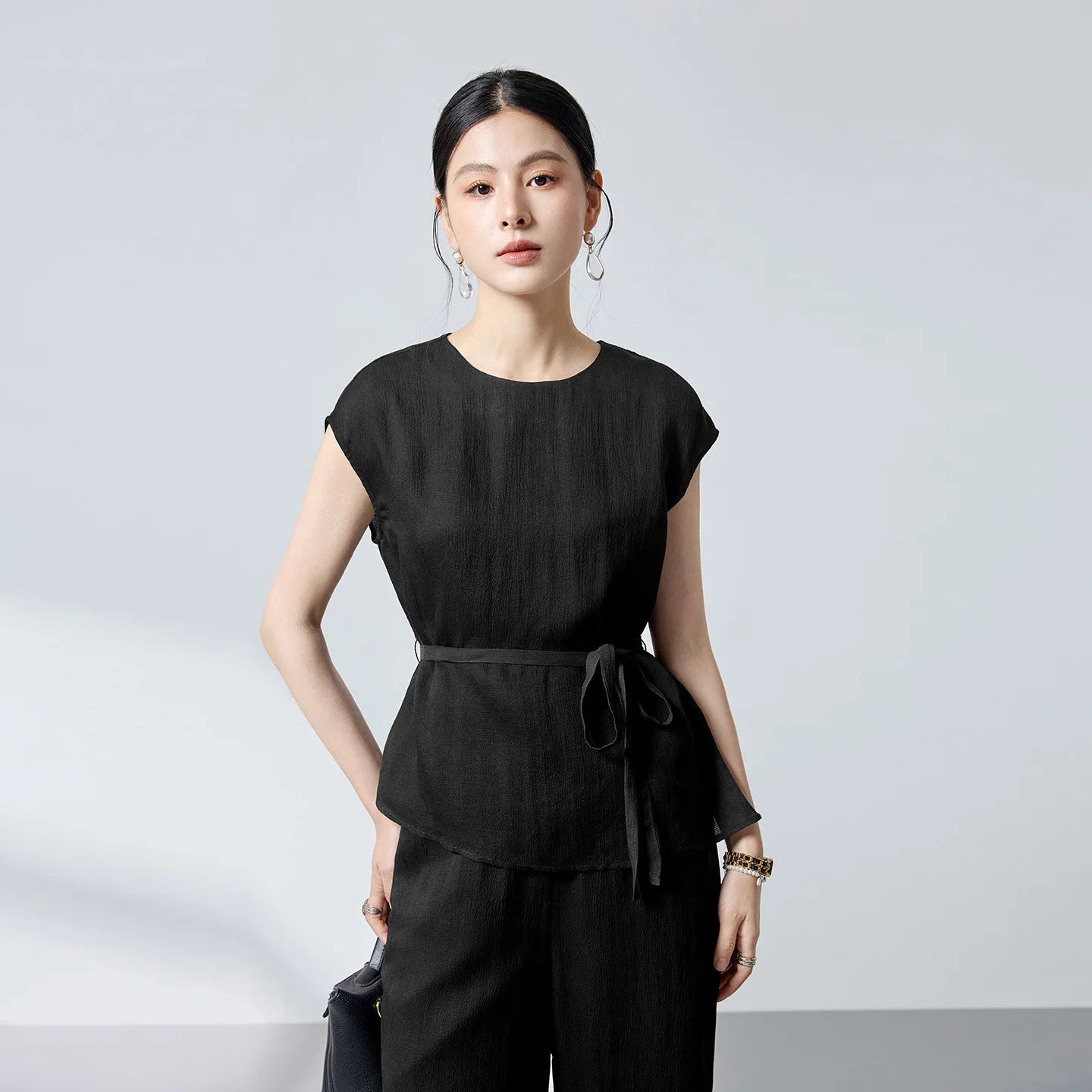Women's Silk blouse in Queen of Spades. Crafted from sand-washed 19 Momme Mulberry Silk with a 3D jacquard crepe texture and defined sash waist. — From Borcelleclothes.