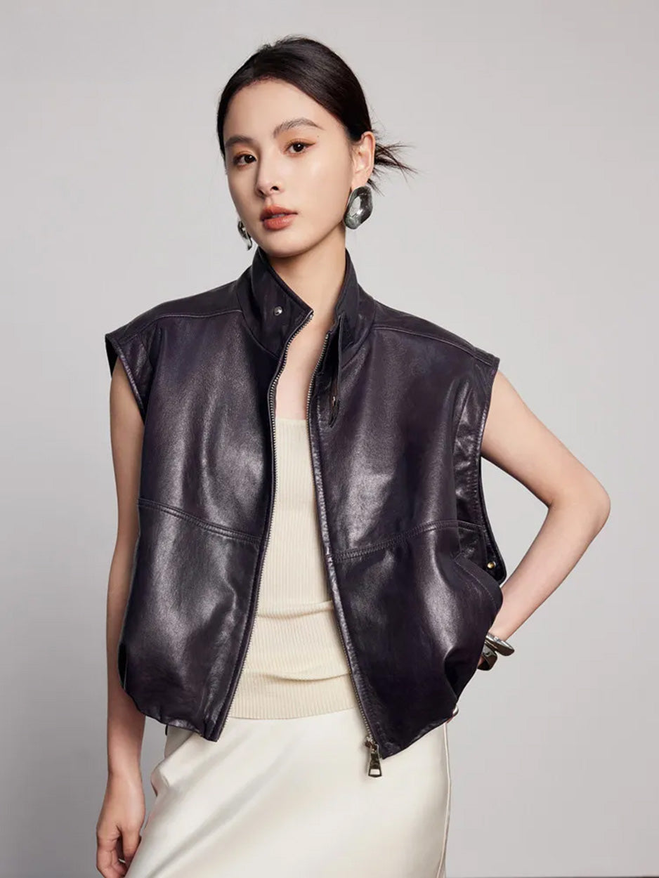 Model wearing the sheepskin jacket converted into a sleeveless vest, showing the deep-cut armscyes — From Borcelleclothes.