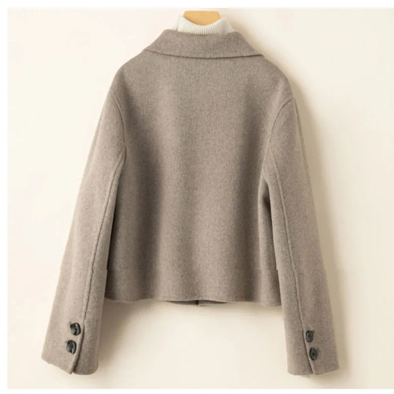 Back of the Women’s Double-Sided Australian Wool Jacket in Almond Frost, highlighting its clean lines and structured elegance. From Borcelleclothes.