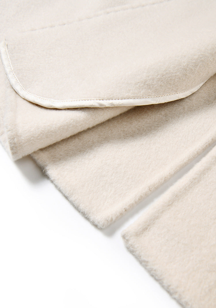 Interior view of the inner side pocket on the double-sided Moment of Promise coat — From Borcelleclothes.