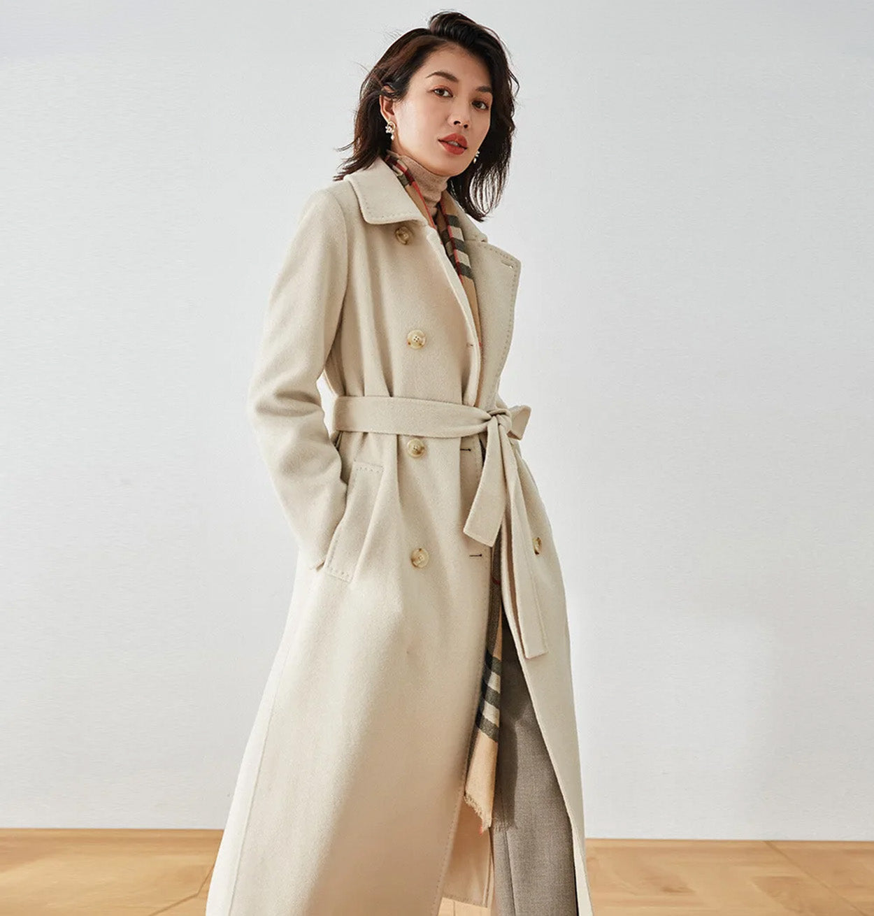 Women's double-sided coat made of Australian wool and cashmere, featuring a pointed collar, eight-button double-breasted closure, and a defined belted waist. Color: Moment of Promise. — From Borcelleclothes.