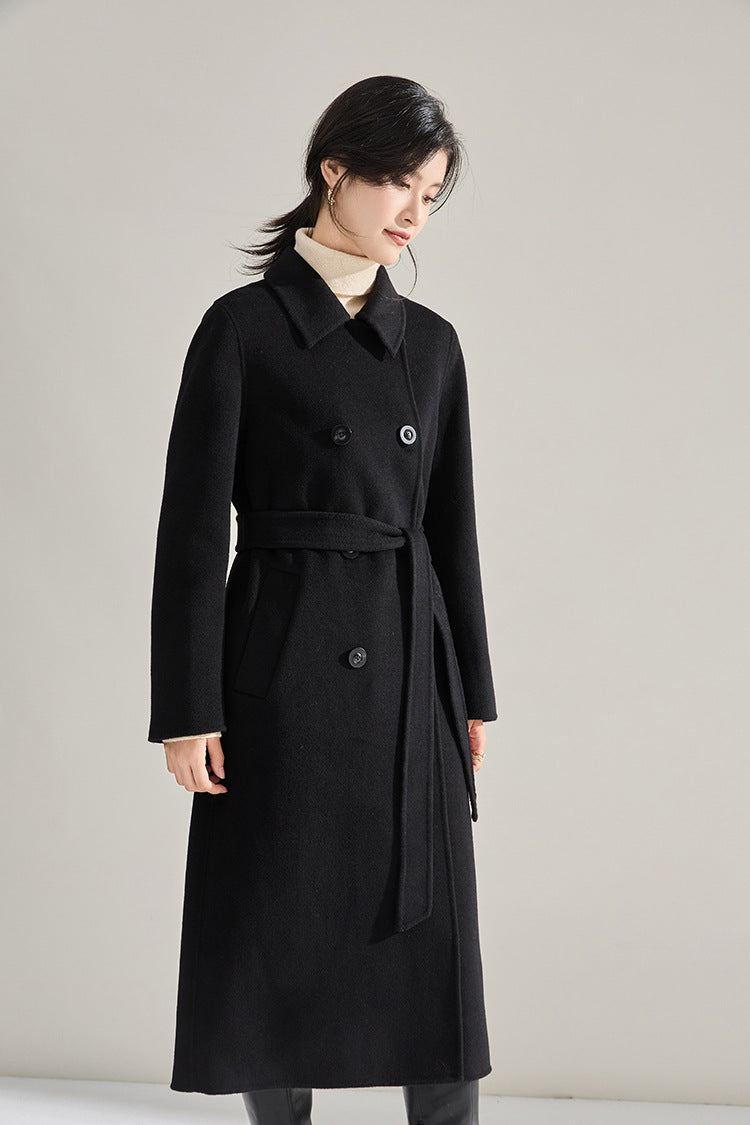 Shadow of a Word wool cashmere coat, model looking down — From Borcelleclothes.