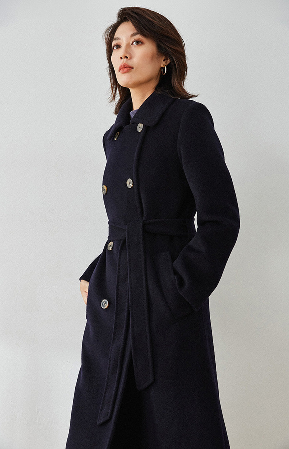 Side-angle of the Written in Ink coat, highlighting the sharp silhouette — From Borcelleclothes.