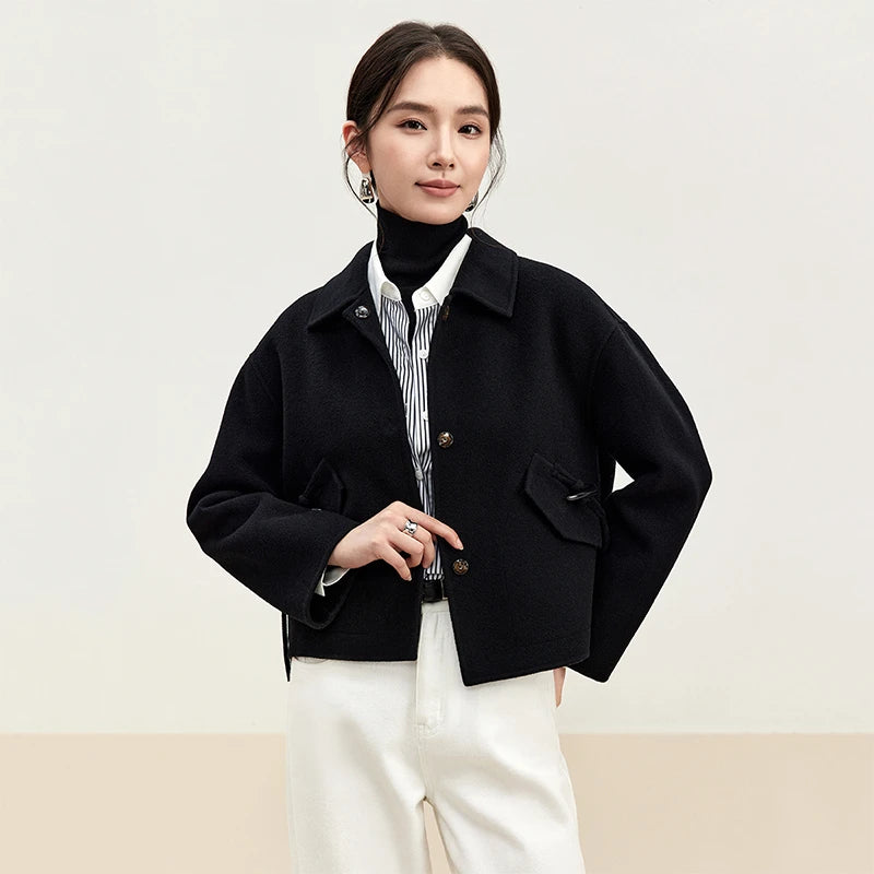Women's hand-finished double-sided wool jacket in Black Hellebore, with decorative bone toggles and wool tassels. — From Borcelleclothes.