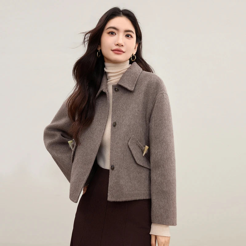 Women's hand-finished double-sided wool jacket in Lost Summit, with decorative bone toggles and wool tassels. — From Borcelleclothes.