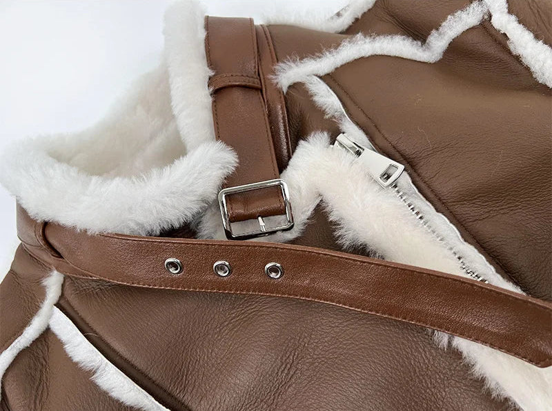 Detail of the collar strap and silver buckle on the Drambuie Cocktail shearling coat — From Borcelleclothes.