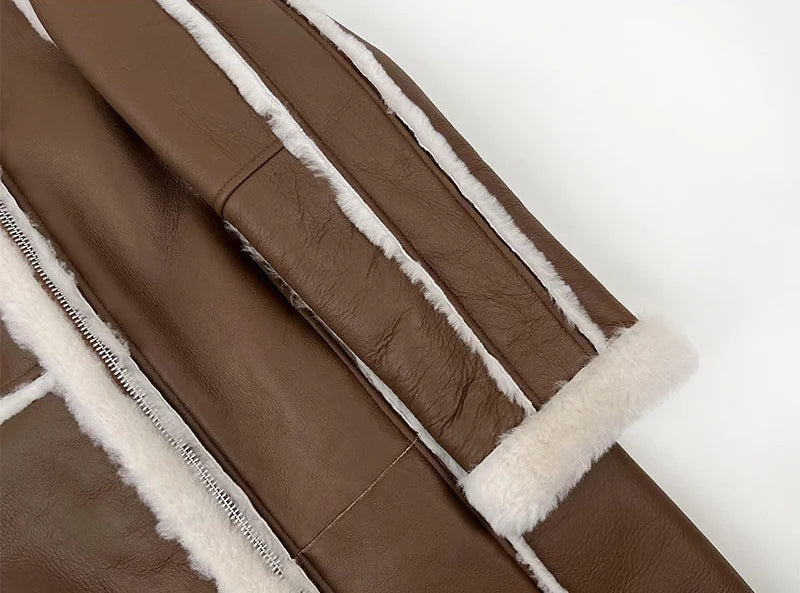 Close view of the turned-back cuff on the Drambuie Cocktail shearling coat — From Borcelleclothes.