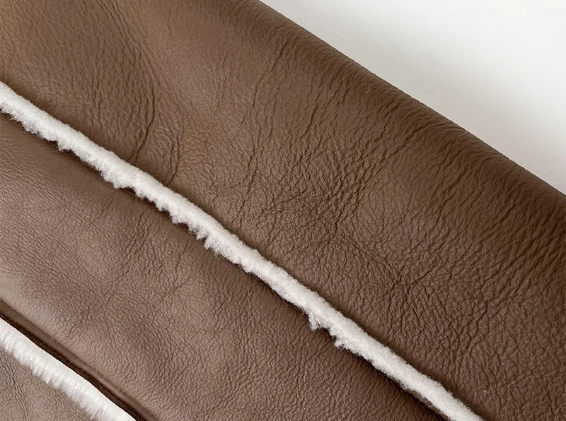 Exposed seam with white fleece trim on the Drambuie Cocktail shearling coat — From Borcelleclothes.