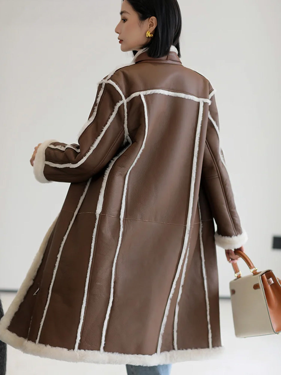 Back view of the Drambuie Cocktail shearling coat with visible white fleece seams — From Borcelleclothes.