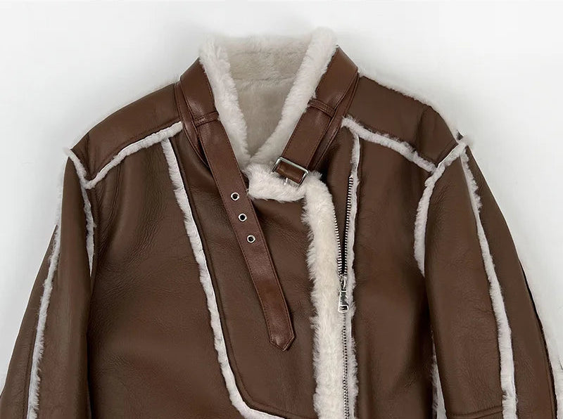Upper part of the Drambuie Cocktail shearling coat showing asymmetrical zip and leather texture — From Borcelleclothes.