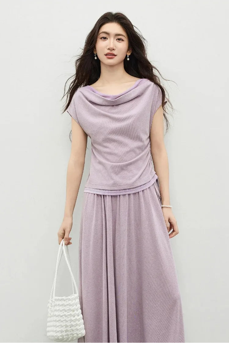 Sophisticated styling: the Gentle Dream set paired with a white woven bag for a refined look. — From Borcelleclothes.