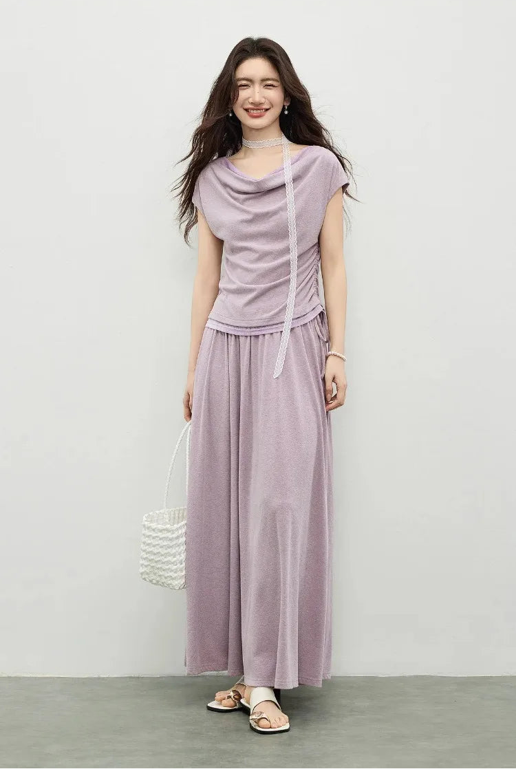 A radiant smile and a confident gaze, showcasing the natural glow of the Gentle Dream shade. — From Borcelleclothes.