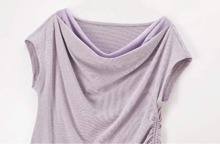 Detailed view of the top’s upper section, highlighting the interplay of light and rib-knit peaks. — From Borcelleclothes.