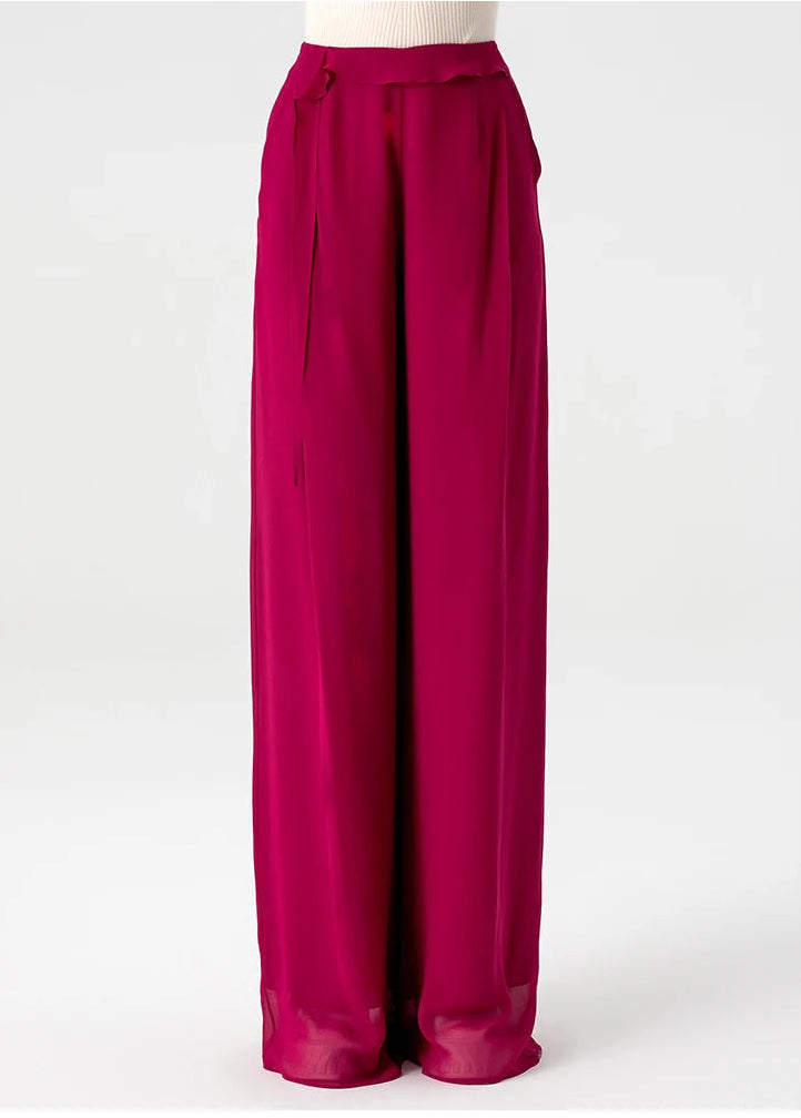 Women's wide-leg Mulberry silk georgette trousers in Raspberry Perspective with an asymmetrical waist overlay, front view — From Borcelleclothes.