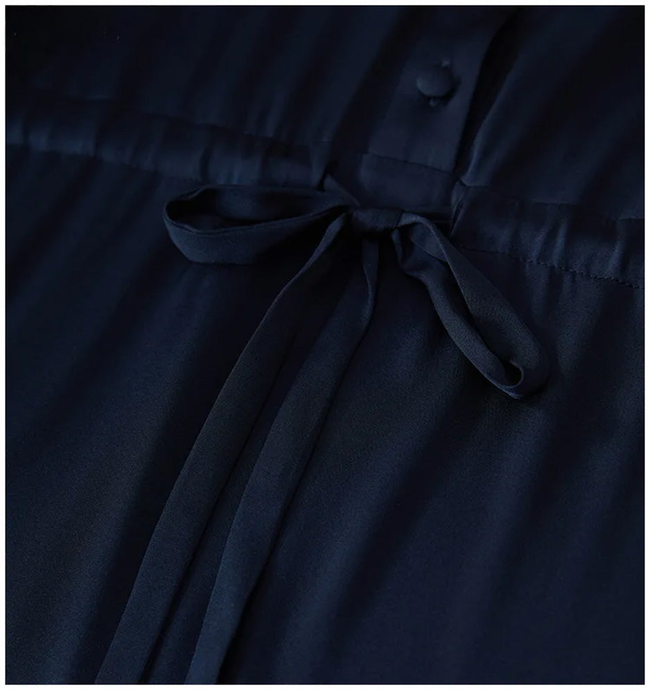 Close-up of the adjustable waist casing with a silk drawstring tied in a delicate bow. — From Borcelleclothes.
