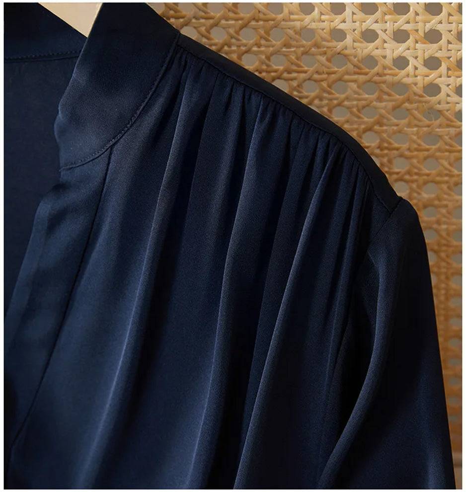 Close-up of the front panel gathered at the shoulder, highlighting the expert craftsmanship of the silk bodice. — From Borcelleclothes.