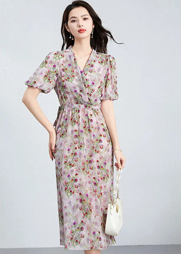 A woman standing confidently in a draped silk wrap dress, highlighting the adjustable waistline and the natural flow of the midi skirt. — From Borcelleclothes.