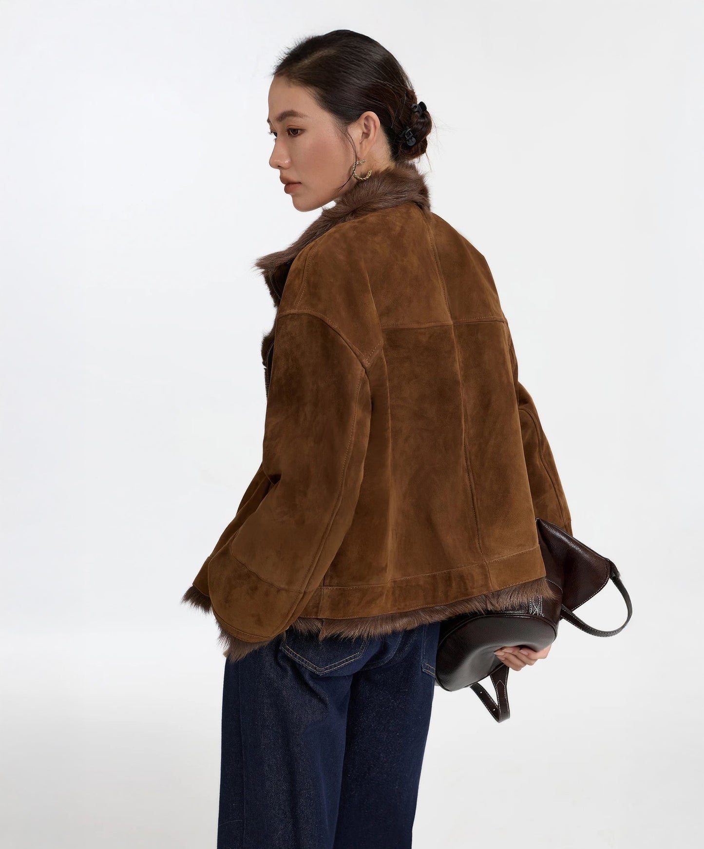 Back view of Dark Rum goatskin jacket, soft dropped-shoulder silhouette visible — From Borcelleclothes.