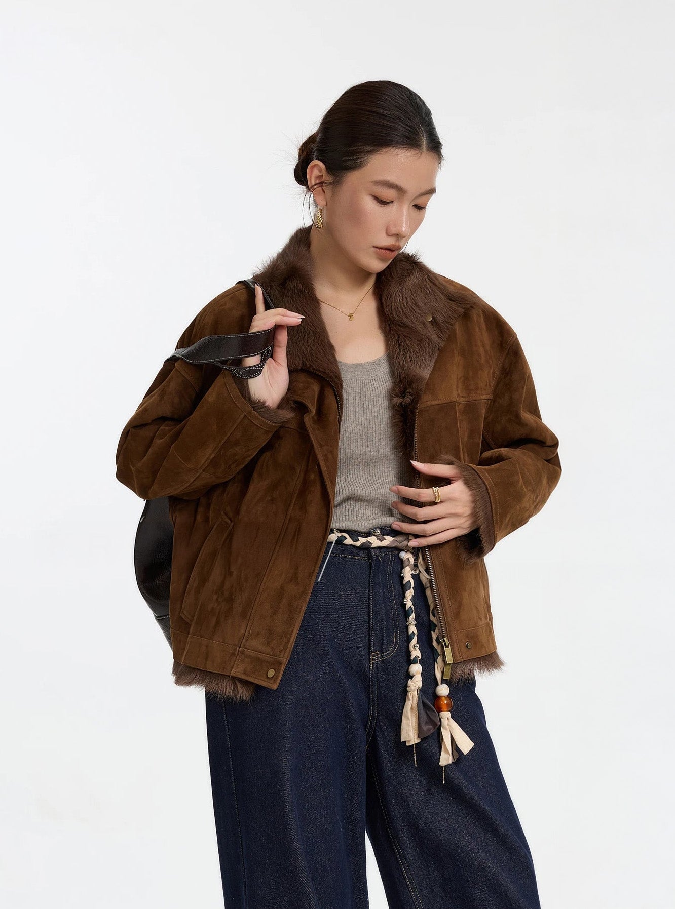 Dark Rum goatskin jacket styled with oversized bag over shoulders — From Borcelleclothes.