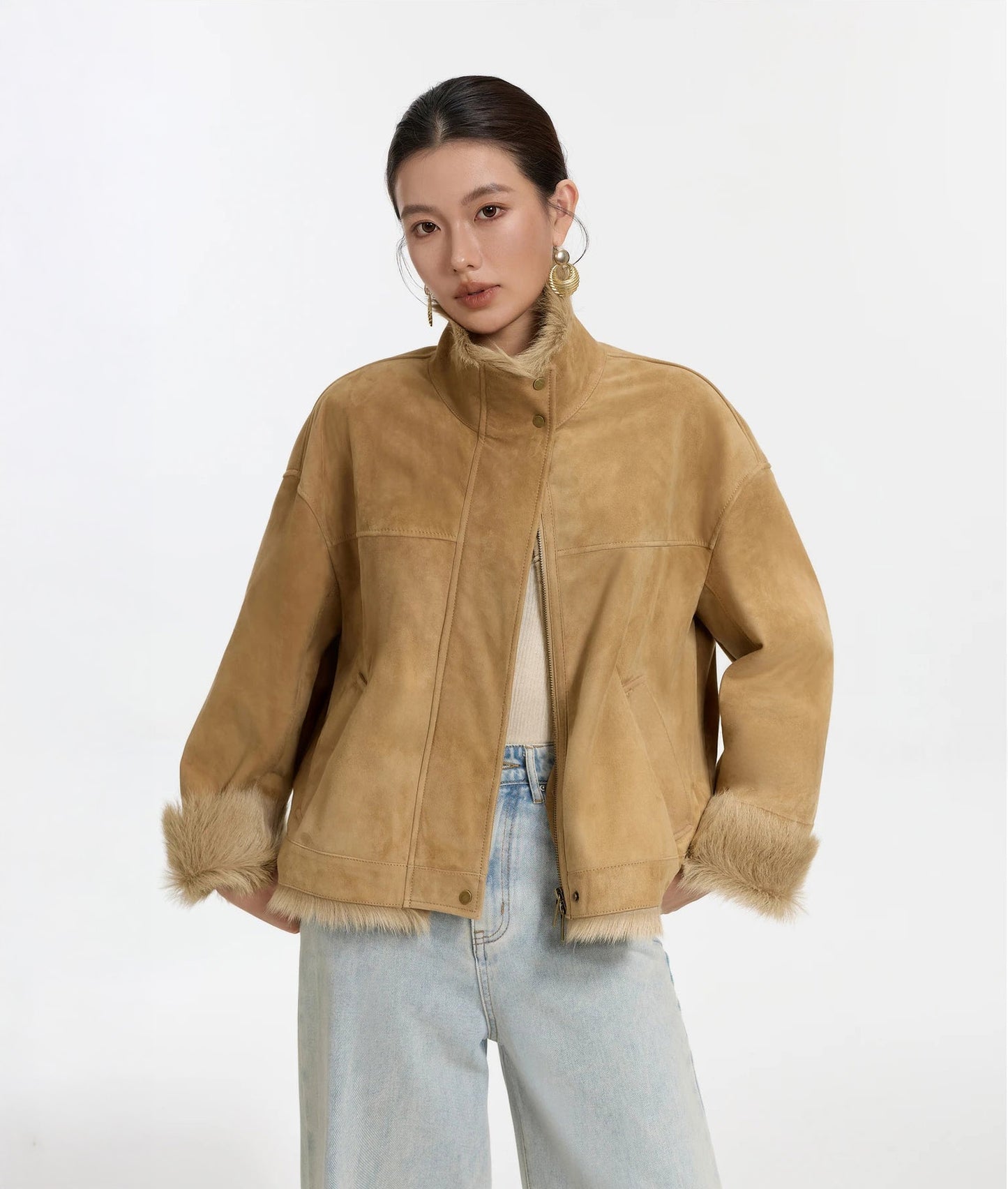 Late Wheat goatskin jacket worn open, model with hands behind back — From Borcelleclothes.