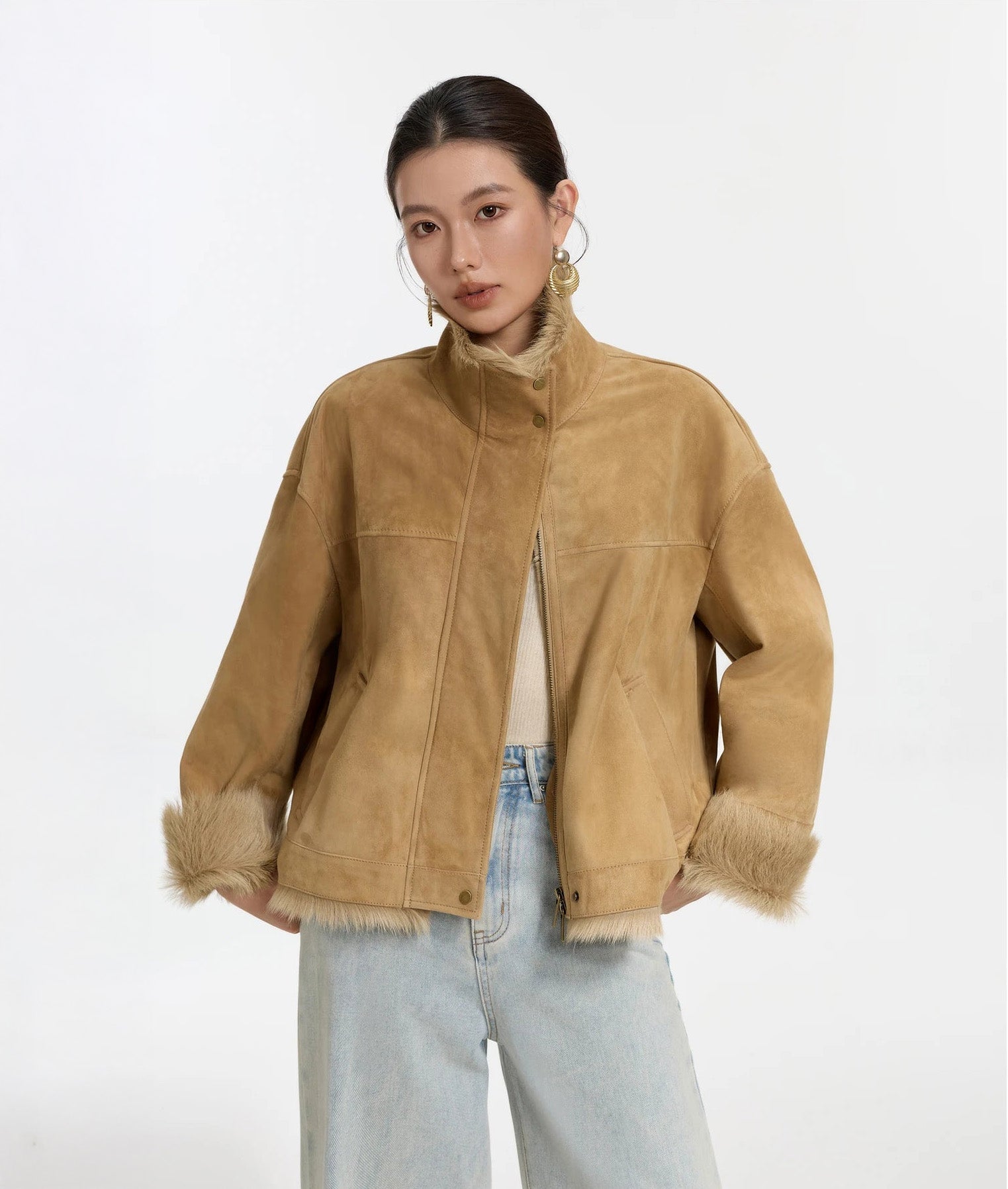 Late Wheat goatskin jacket worn open, model with hands behind back — From Borcelleclothes.
