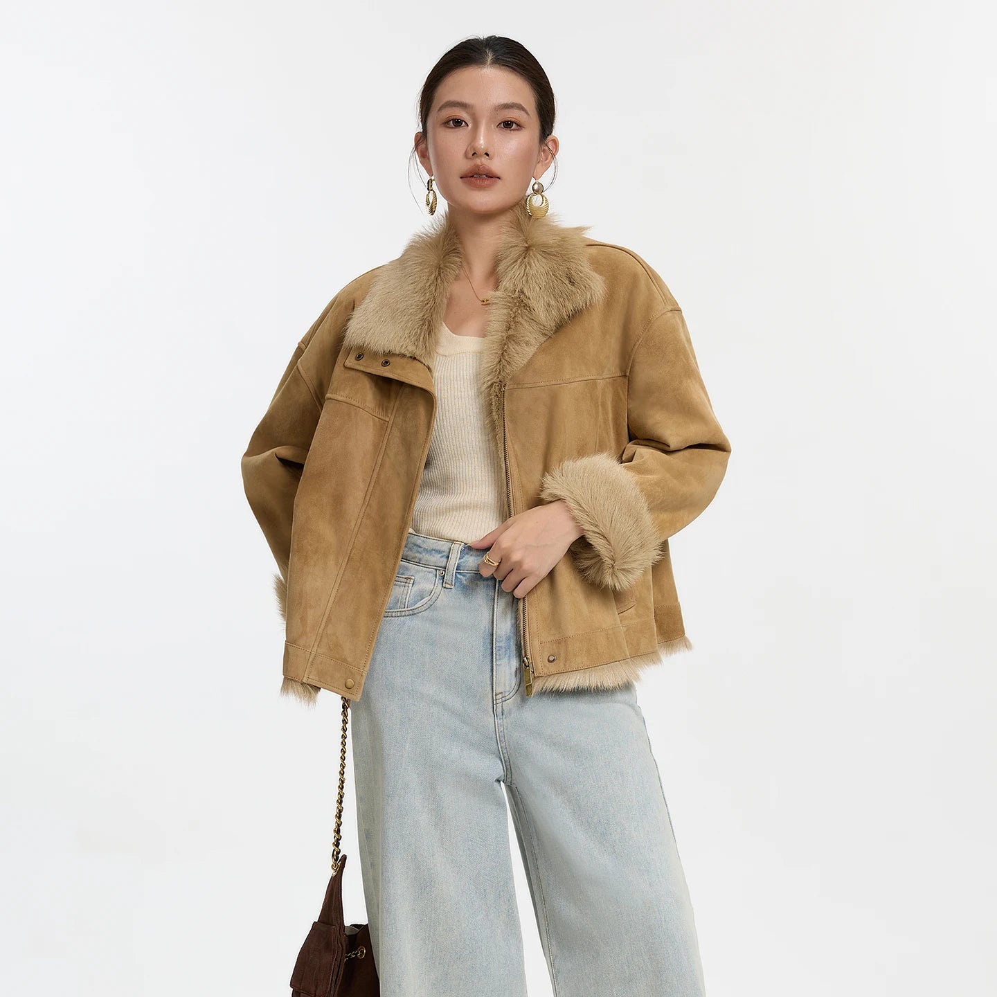 Women's dropped-shoulder Goatskin jacket in Late Wheat, with exposed fur trims, suede finish, and turn-back cuffs. — From Borcelleclothes.