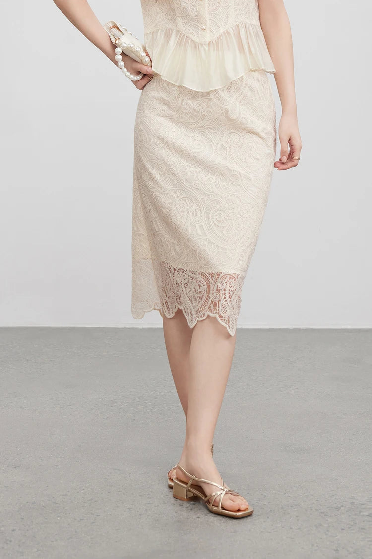 Close-up of the pencil skirt’s silhouette, highlighting the intricate embroidery inspired by Irish lace. — From Borcelleclothes.