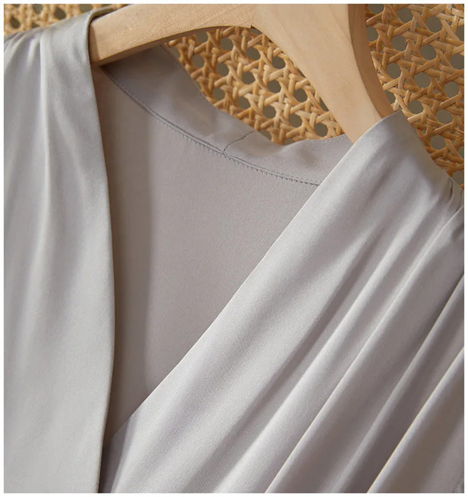 Close-up of the continuous-cut collar extending from the front panels, crafted from premium silk georgette — From Borcelleclothes.