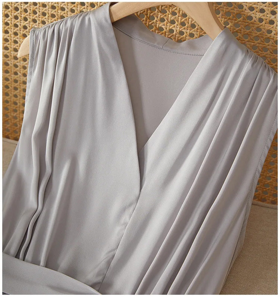 The upper bodice of the silk dress, featuring the fixed wrap design and seamless-looking collar transition — From Borcelleclothes.
