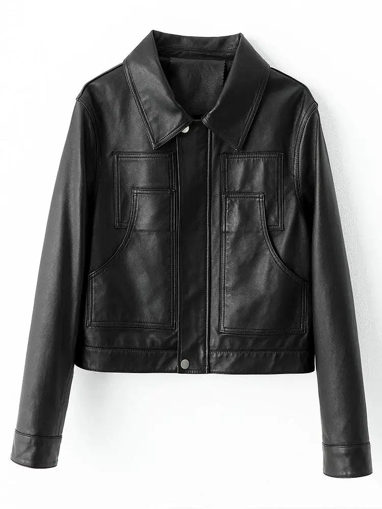 Women's Vegetable-tanned full-grain sheepskin jacket in Faded to Black, with an uncoated, natural finish. Features a boxy cropped silhouette, sharp collar, and overlaid details. — From Borcelleclothes.