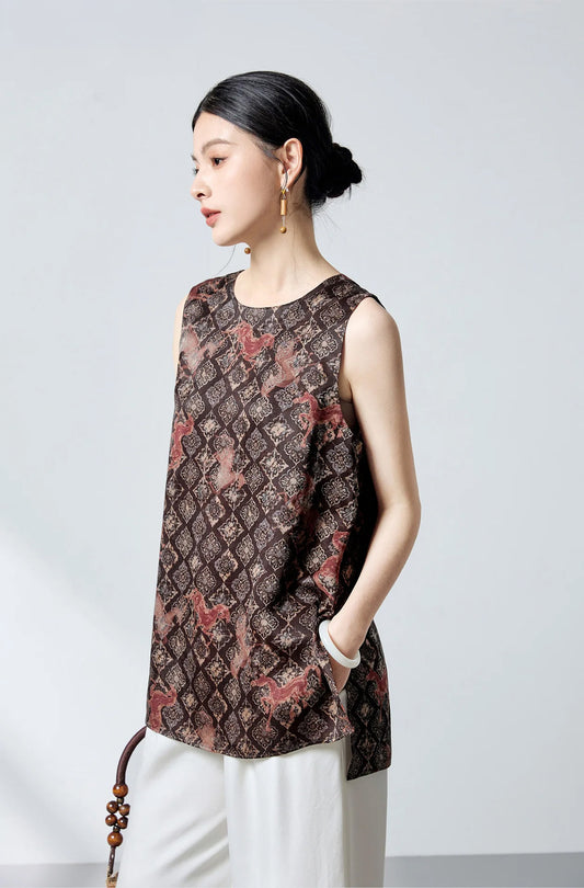 Model turned slightly to the side wearing the Fire Steeds Xiangyunsha silk jacquard top in espresso and terracotta — From Borcelleclothes.