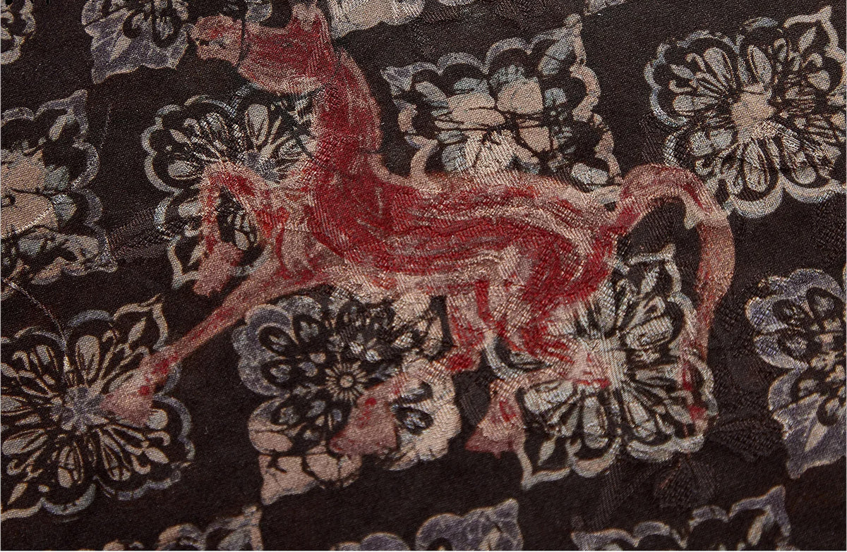 Intricate close-up of the dynamic fire steed motif overlaid onto the mineral-cured silk jacquard — From Borcelleclothes.