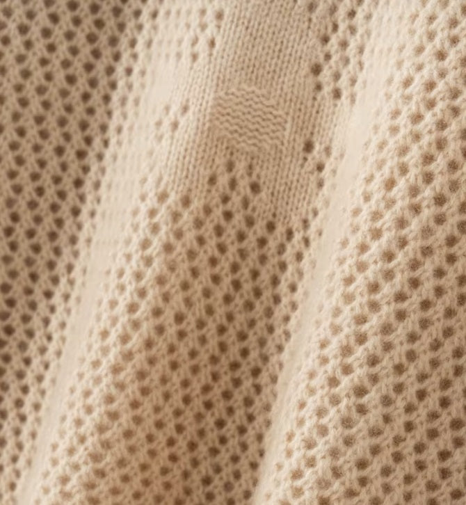 Textured draping of the Brandy floral lace sweater in Alashan cashmere — From Borcelleclothes.