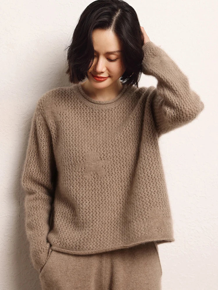 Model in Light Taupe lace cashmere sweater adjusting her hair — From Borcelleclothes.