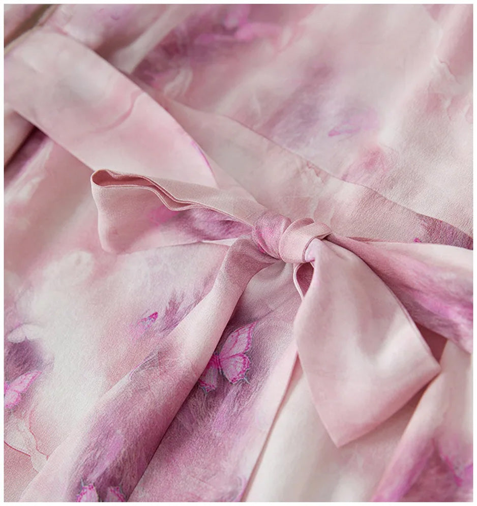 Close-up of the self-tied silk sash cinching the waist, creating a beautifully defined silhouette — From Borcelleclothes.