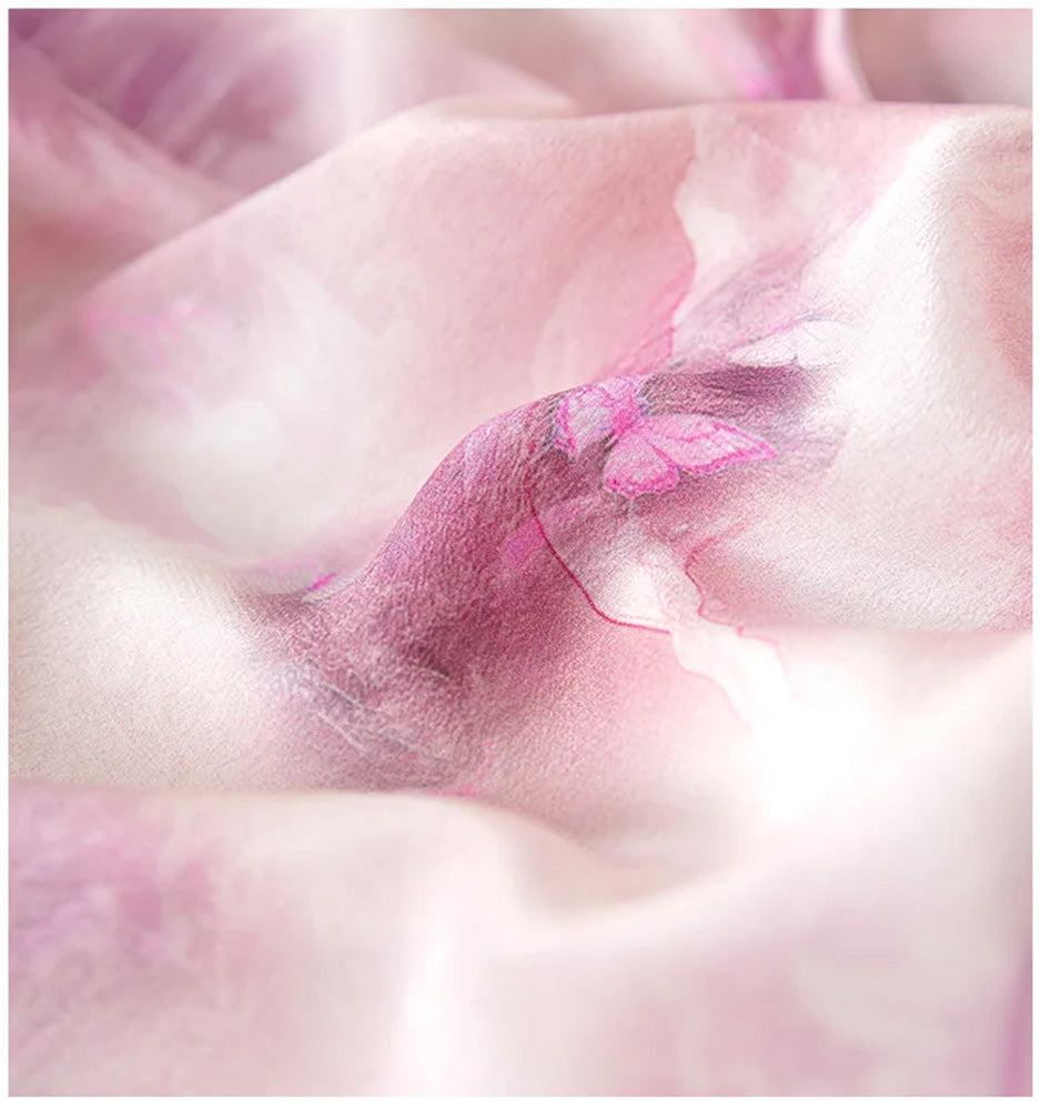 Close-up of the delicate, wave-folded texture of 100% crepe de chine silk in the exclusive misty-purple Highland Heather print — From Borcelleclothes.