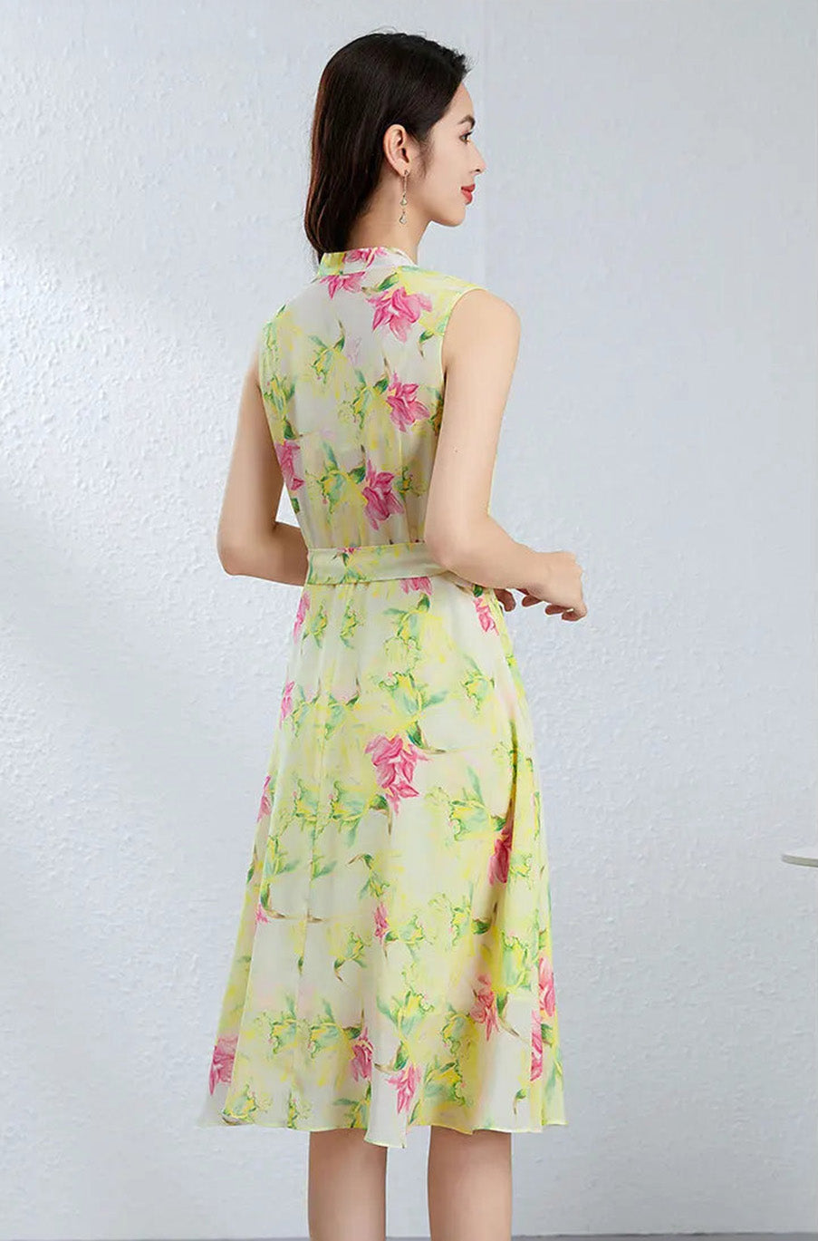 Back view of a woman wearing the Magnolia in May silk dress, showcasing the clean fit, waist darts, and matching silk sash — From Borcelleclothes.
