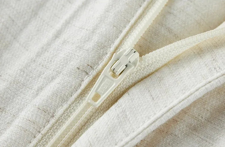 A technical close-up of the high-quality zipper fly and internal finishing of the trousers. — From Borcelleclothes.