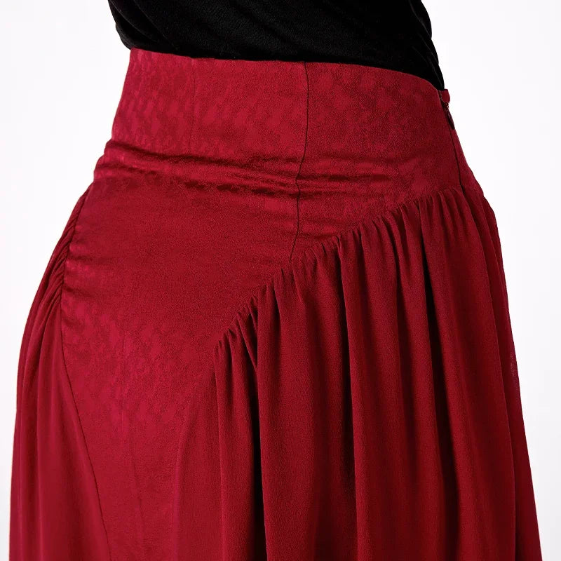 Detail view of the high-waisted back section featuring the clean silhouette and side zipper closure — From Borcelleclothes.