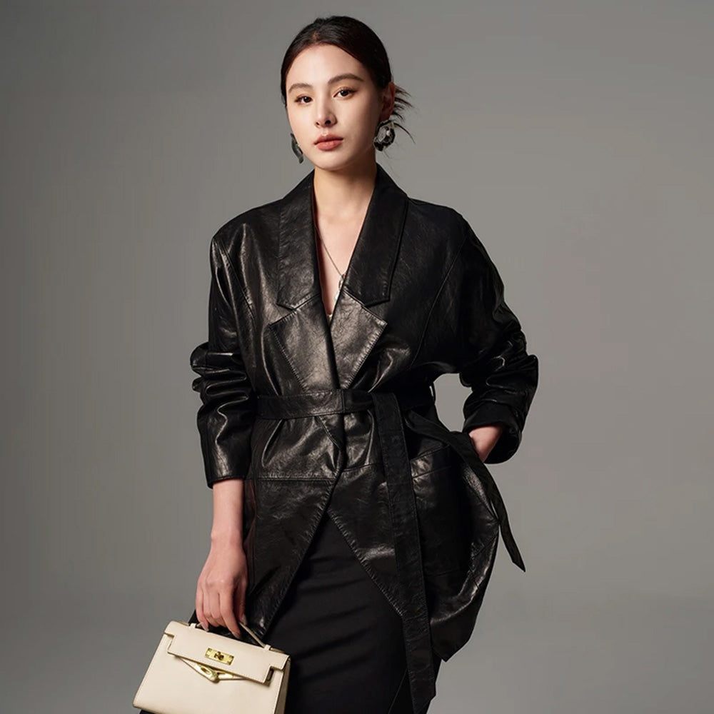 Women's Glazed goatskin nappa wrap jacket in Vola Con Me. Tailored with low-notch lapels, tapering kimono sleeves, and the fluid drape of heavy silk. — From Borcelleclothes.
