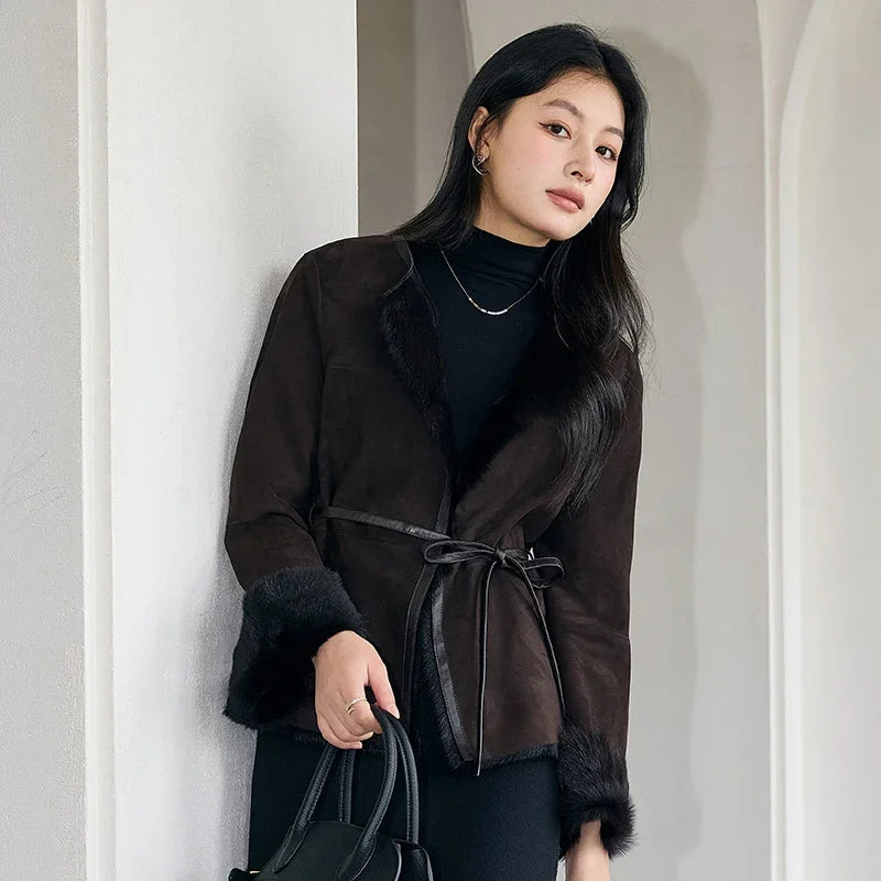 Women’s slim-fit goatskin jacket in Tamarind with round neckline, leather-bound edges, and full inner wool — From Borcelleclothes.